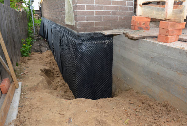 SJ Waterproofing Pros technician performing targeted Emergency Waterproofing assessment in Worthington, MN